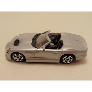 Shelby Series 1 1999 1:43 Bburago zilverkleurig