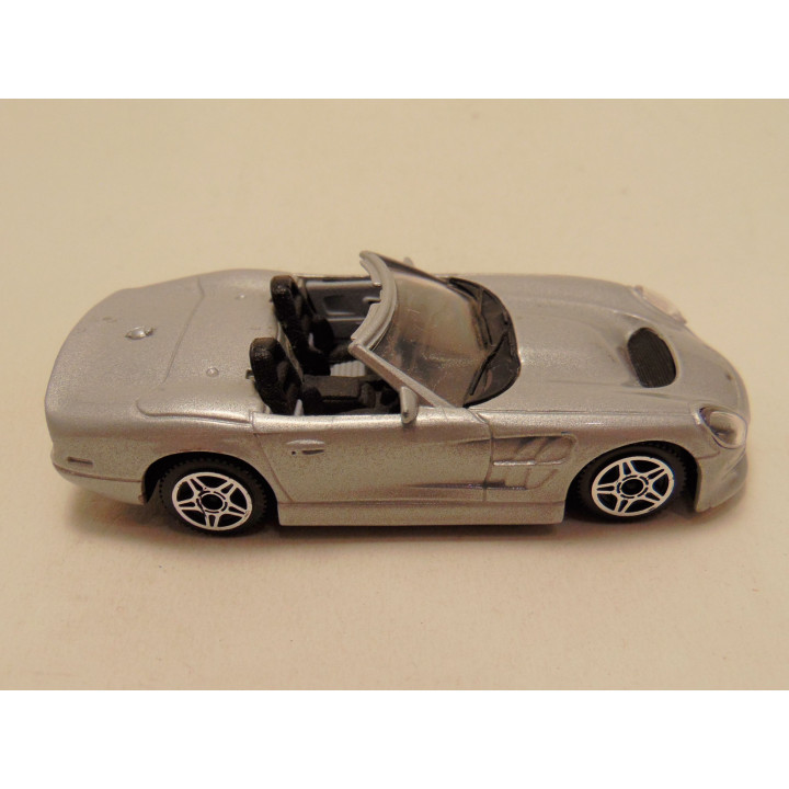 Shelby Series 1 1999 1:43 Bburago zilverkleurig
