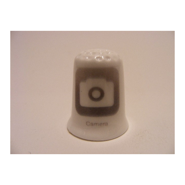 Apple icoon camera afbeelding op een porselein vingerhoedje