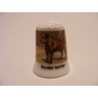 Border terrier getekend op een porselein vingerhoedje