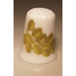 Druiven op een porselein vingerhoedje Druiven op een porselein vingerhoedje