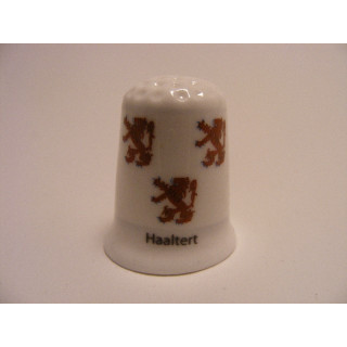 Haaltert vlag Belgie op een porselein vingerhoedje