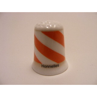 Honnelles vlag Belgie op een porselein vingerhoedje