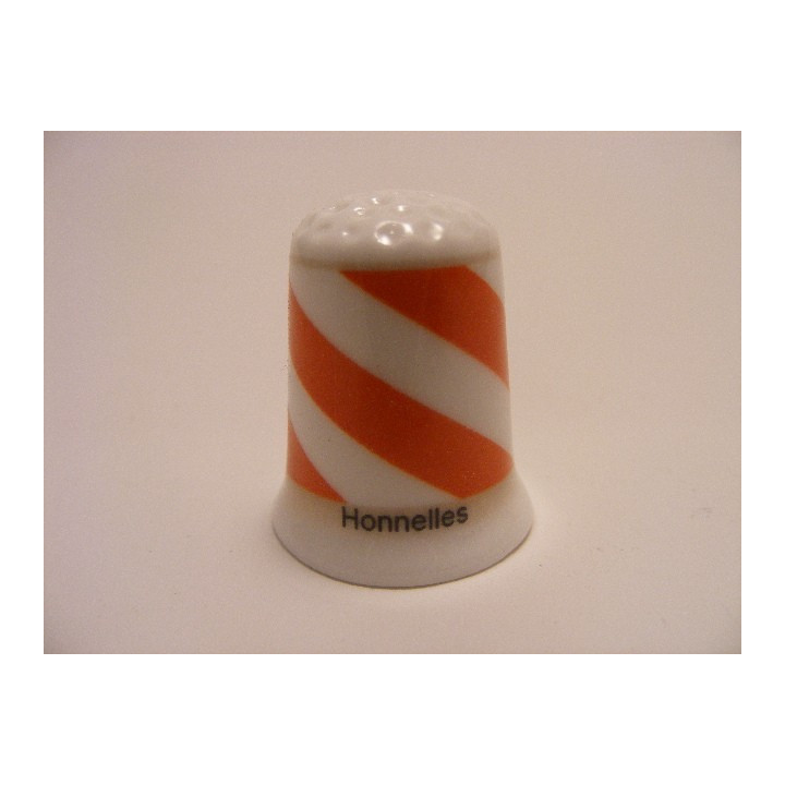 Honnelles vlag Belgie op een porselein vingerhoedje