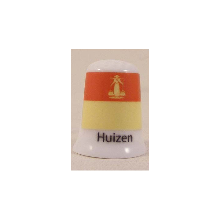 Huizen Nederlandse gemeentevlag op een porselein vingerhoedje