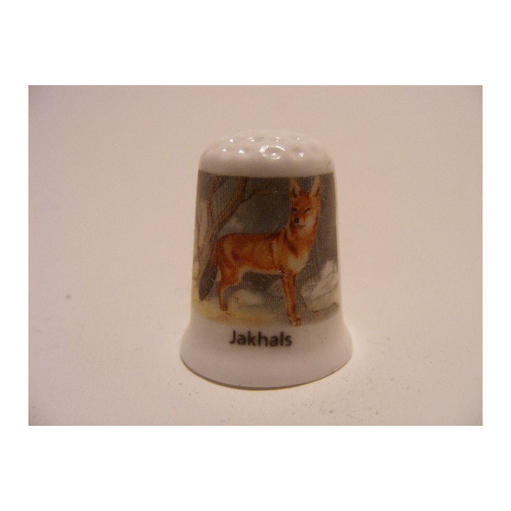 Jakhals getekend op een porselein vingerhoedje
