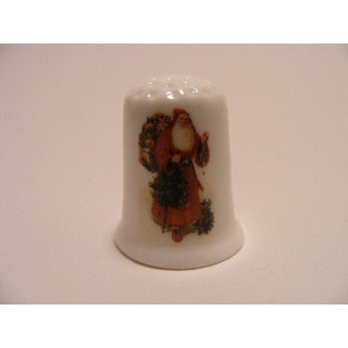 Kerstman op een porselein vingerhoedje