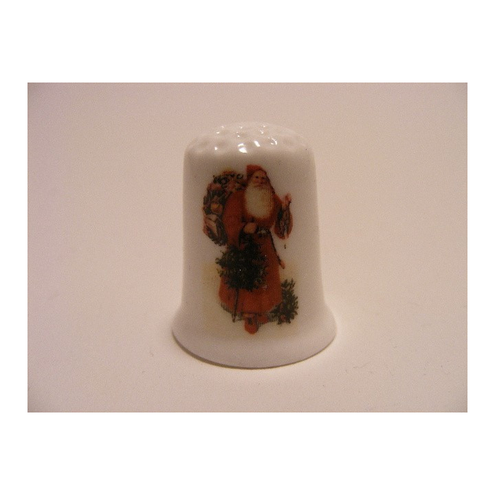 Kerstman op een porselein vingerhoedje
