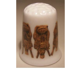 Kikkers horen zien zwijgen op een porselein vingerhoedje