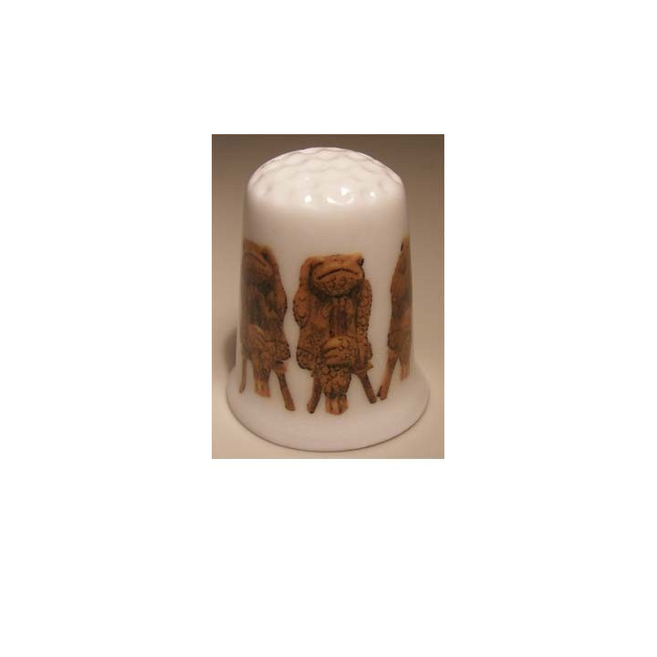 Kikkers horen zien zwijgen op een porselein vingerhoedje