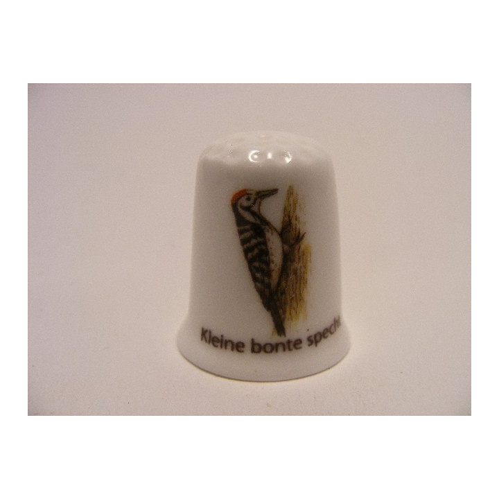 Kleine bonte specht vogel vingerhoedje