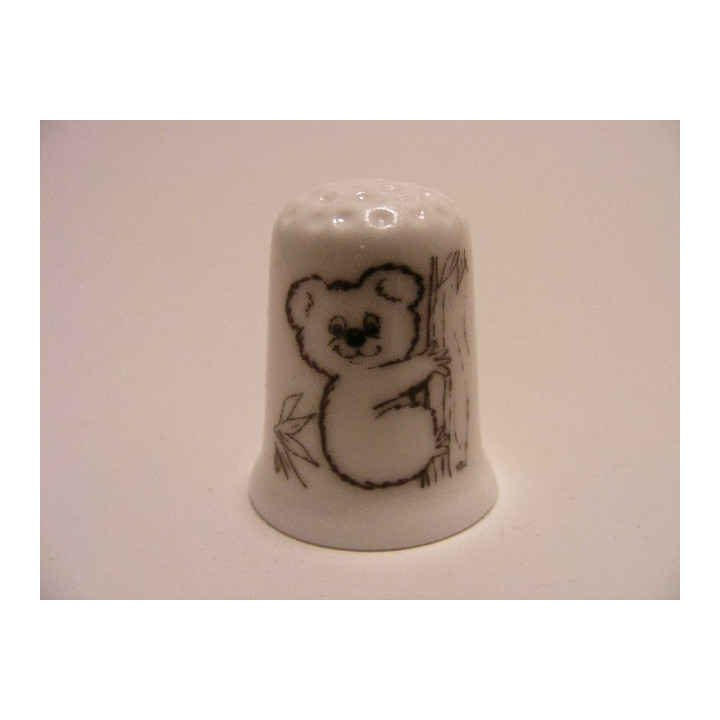 Koala getekend linkerkant boom op een porselein vingerhoedje