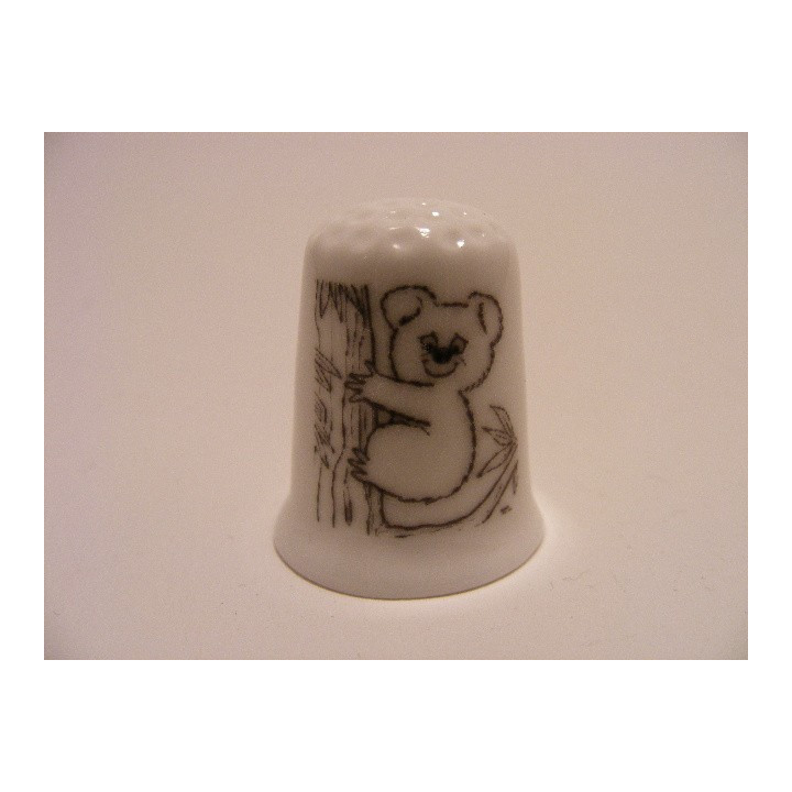 Koala getekend rechterkant boom op een porselein vingerhoedje