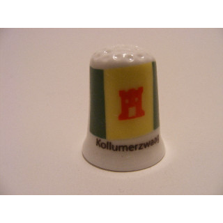 Kollumerzwaag op een porselein vingerhoedje