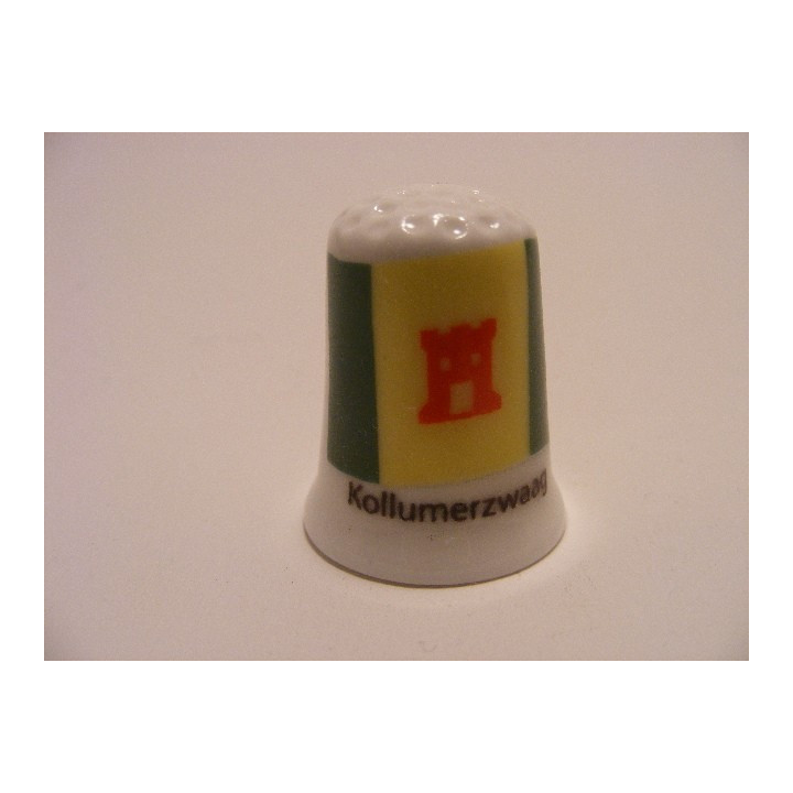 Kollumerzwaag op een porselein vingerhoedje Kollumerzwaag op een porselein vingerhoedje