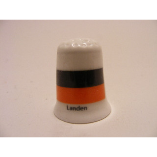 Landen vlag in Belgie op een porselein vingerhoedje