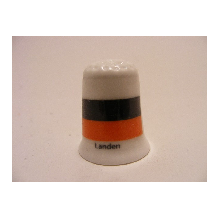 Landen vlag in Belgie op een porselein vingerhoedje