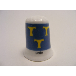 Lede vlag Belgie op een porselein vingerhoedje