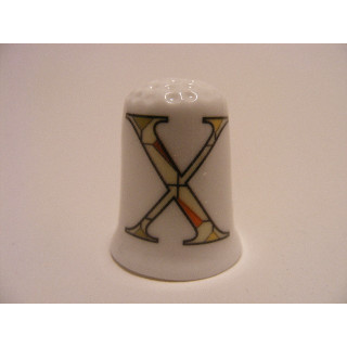 Letter X patchwork stijl op een porselein vingerhoedje