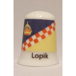 Lopik Nederlandse gemeentevlag op een porselein vingerhoedje