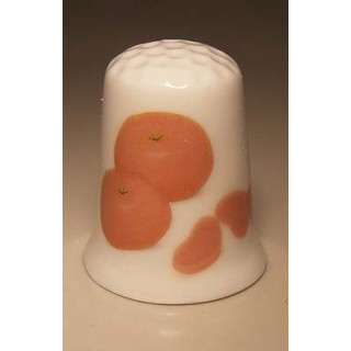 Manderijnen op een porselein vingerhoedje