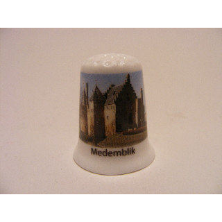 Medemblik stad in de gemeente Medemblik op een porselein vingerhoedje