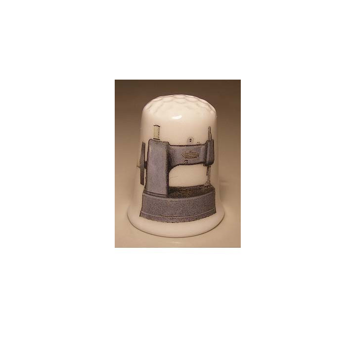 Naaimachine van metaal foto vingerhoedje