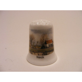 Neck is een dorp in de gemeente Wormerland op een porselein vingerhoedje Neck is een dorp in de gemeente Wormerland op een porselein vingerhoedje