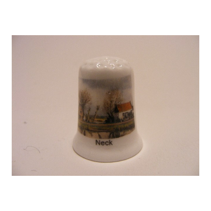 Neck is een dorp in de gemeente Wormerland op een porselein vingerhoedje Neck is een dorp in de gemeente Wormerland op een porselein vingerhoedje