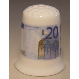 Nederlands geld 20 euro op een porselein vingerhoedje Nederlands geld 20 euro op een porselein vingerhoedje