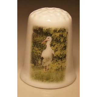 Ooievaar foto op een porselein vingerhoedje