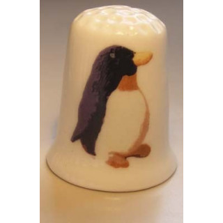Pinguin afbeelding op een porselein vingerhoedje