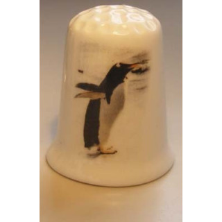Pinguin bedrukking op een porselein vingerhoedje