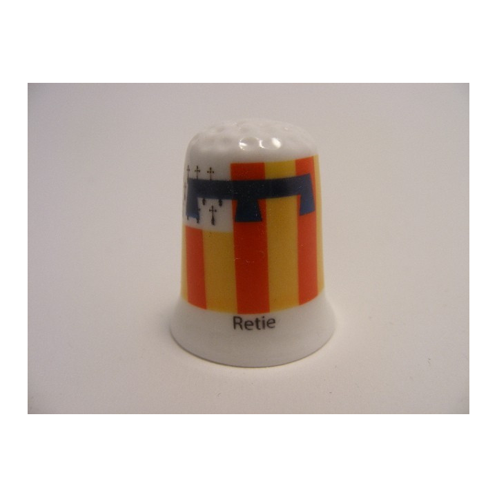 Retie vlag Belgie op een porselein vingerhoedje