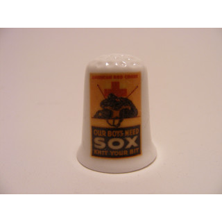 Rode Kruis SOX op een porselein vingerhoedje