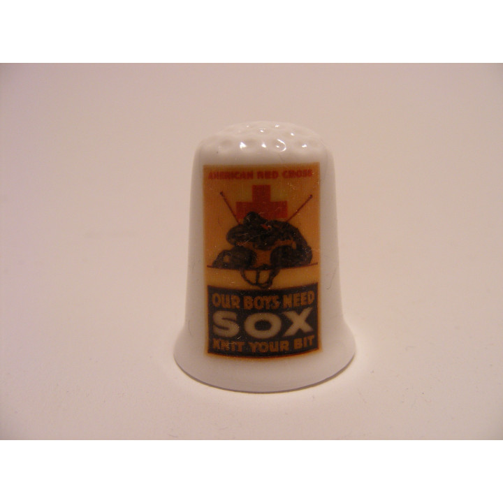 Rode Kruis SOX op een porselein vingerhoedje