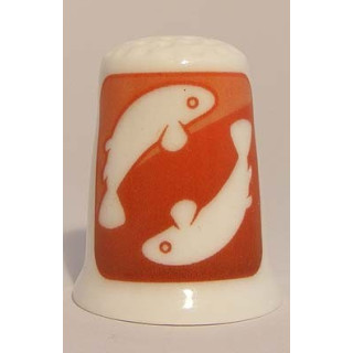 Sterrenbeeld Vissen horoscoop op een porselein vingerhoedje