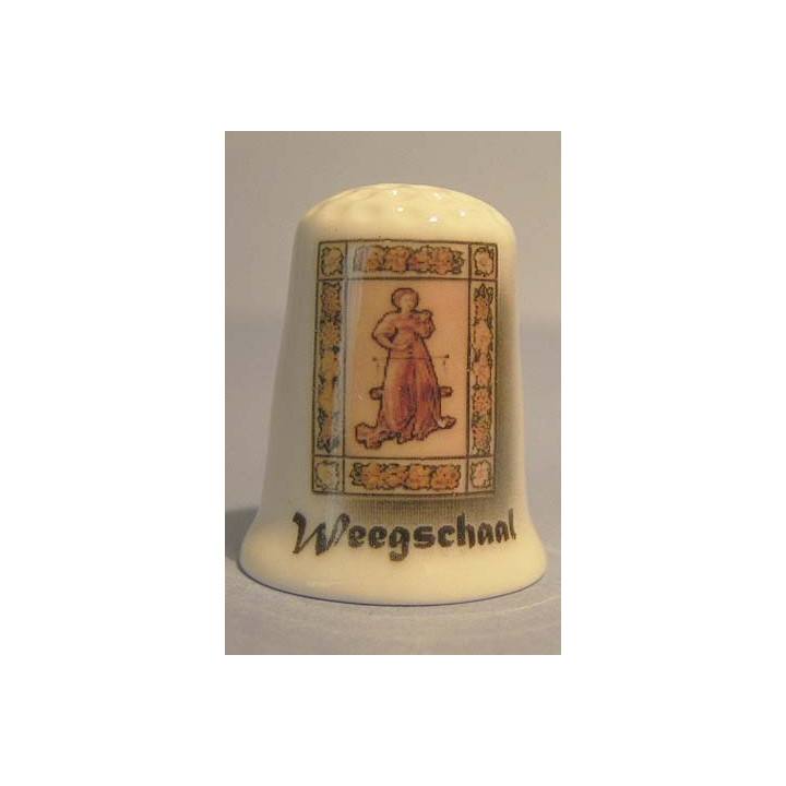 Sterrenbeeld Weegschaal op een porselein vingerhoedje