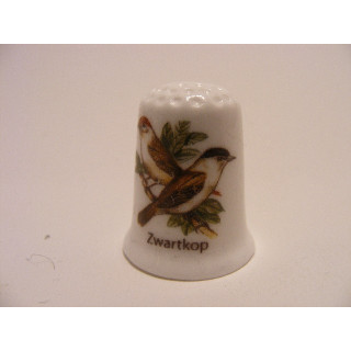 Zwartkop zangvogel vingerhoedje