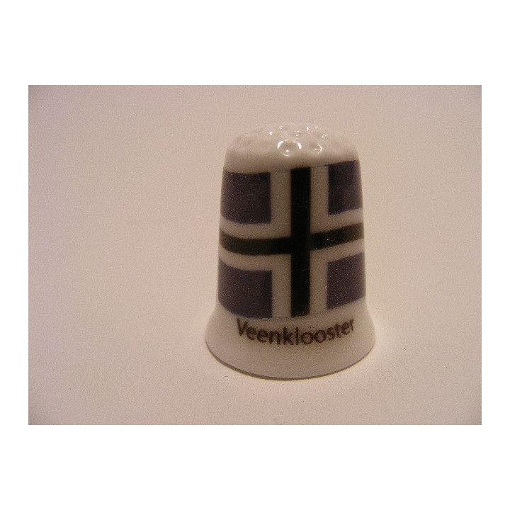 Veenklooster op een porselein vingerhoedje
