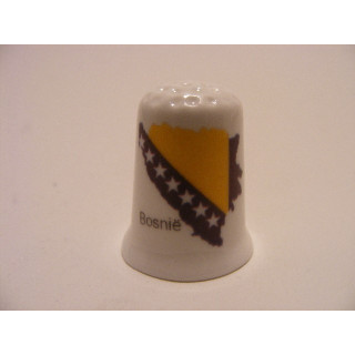 Vlag en land van Bosnie op een porselein vingerhoedje