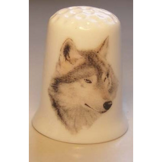 Wolf getekend op een porselein vingerhoedje