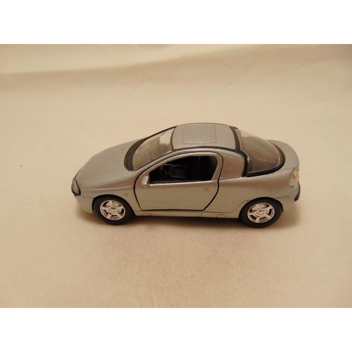 Opel Tigra Tins Toys 1:38 zilverkleurig