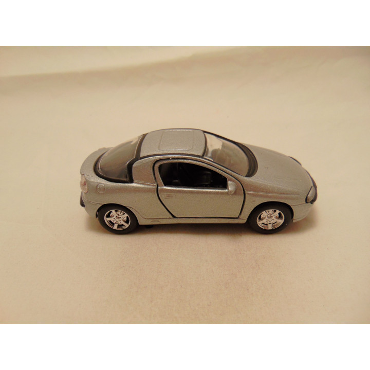 Opel Tigra twintop Tins Toys 1:38 zilverkleurig