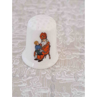 Kind op de schoot van Sinterklaas tekening vingerhoedje