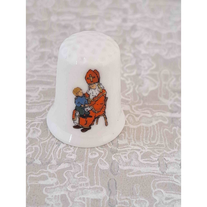 Kind op de schoot van Sinterklaas tekening vingerhoedje