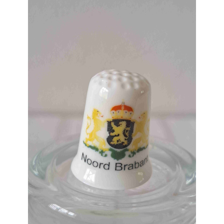 Provinciewapen van Noord Brabant op een vingerhoedje