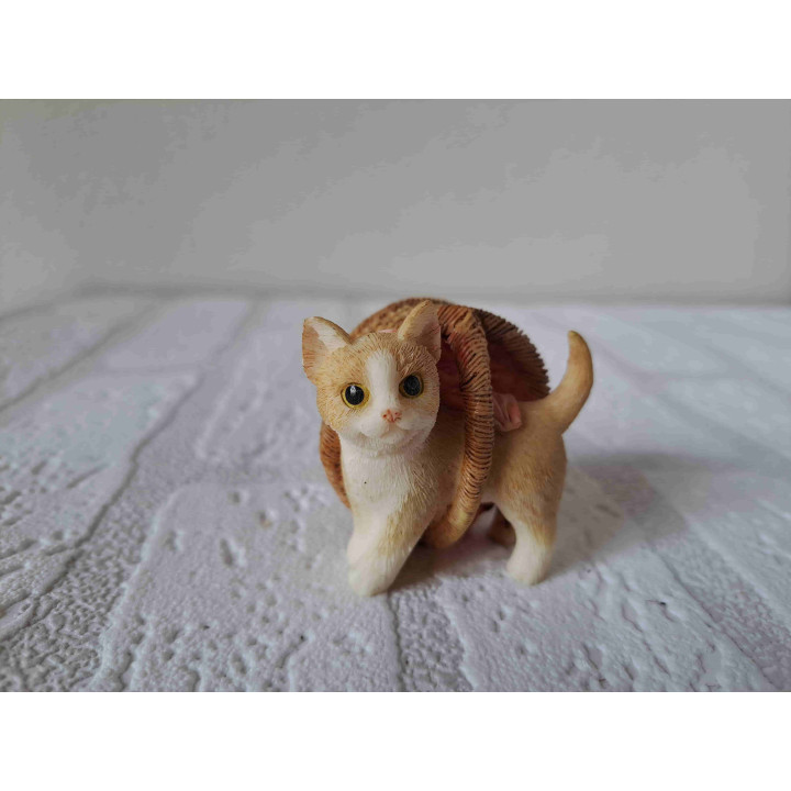 Poes in mand van kunsthars