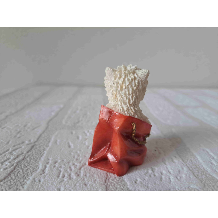 West highland terrier hond in een draagtas