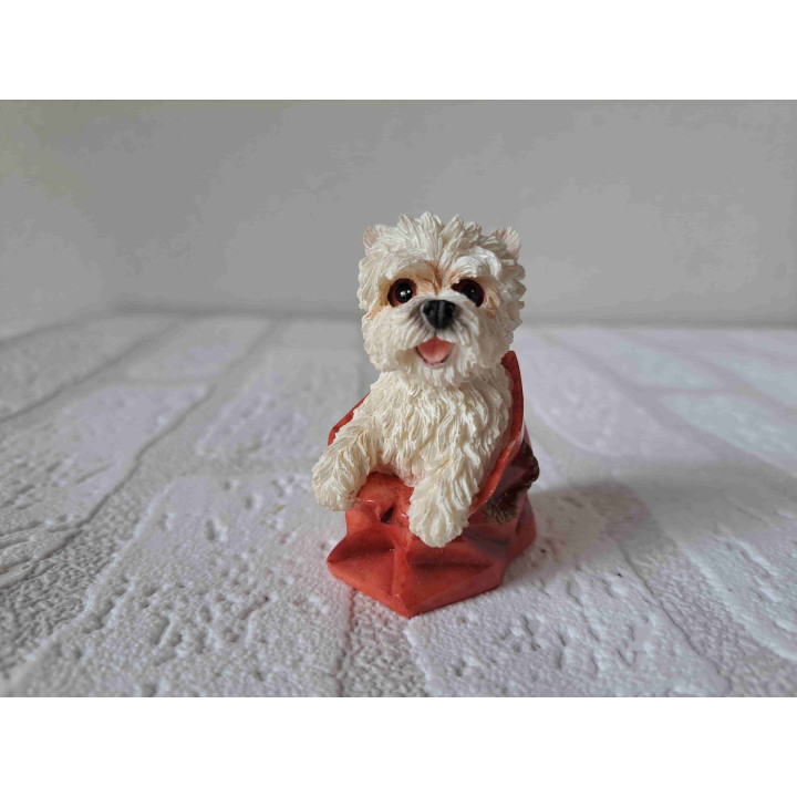 West highland terrier hond in een draagtas